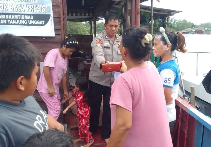 Polsek Bukit Bestari Gelar Dapur Umum, Bagikan 200 Paket Makanan untuk Warga Terdampak Banjir Rob